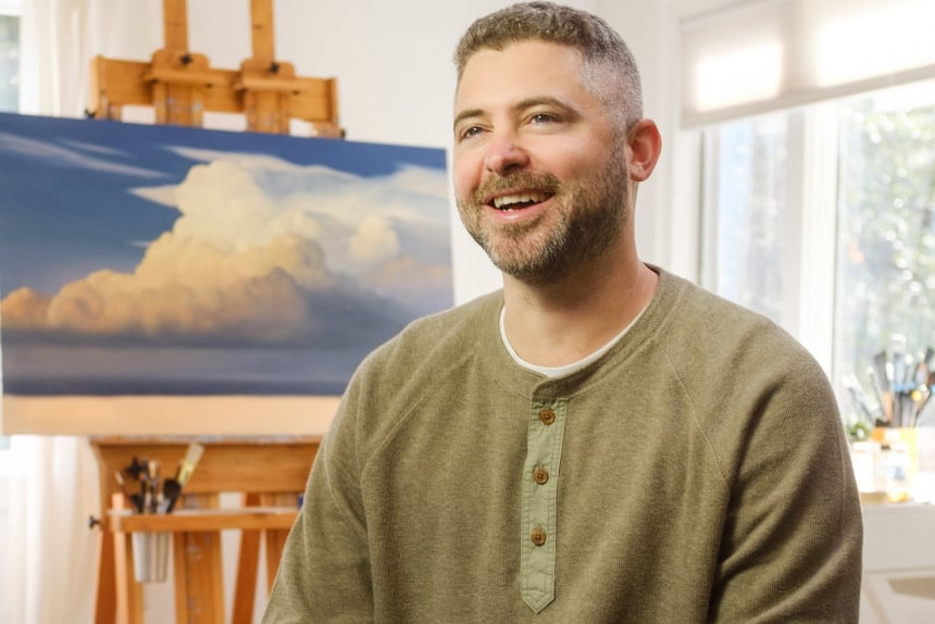 Portrait of artist in painting studio