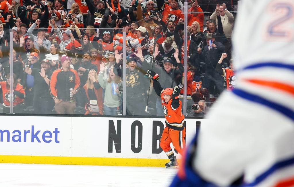 Troy Terry celebrates in front of exuberant fans at Honda Center during the first round of the 2026 Stanley Cup Playoffs.