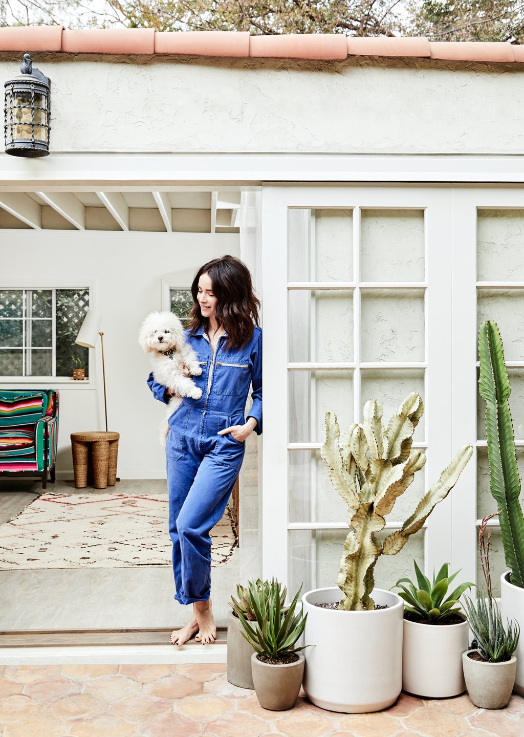 Abigail Spencer seated, looking to camera