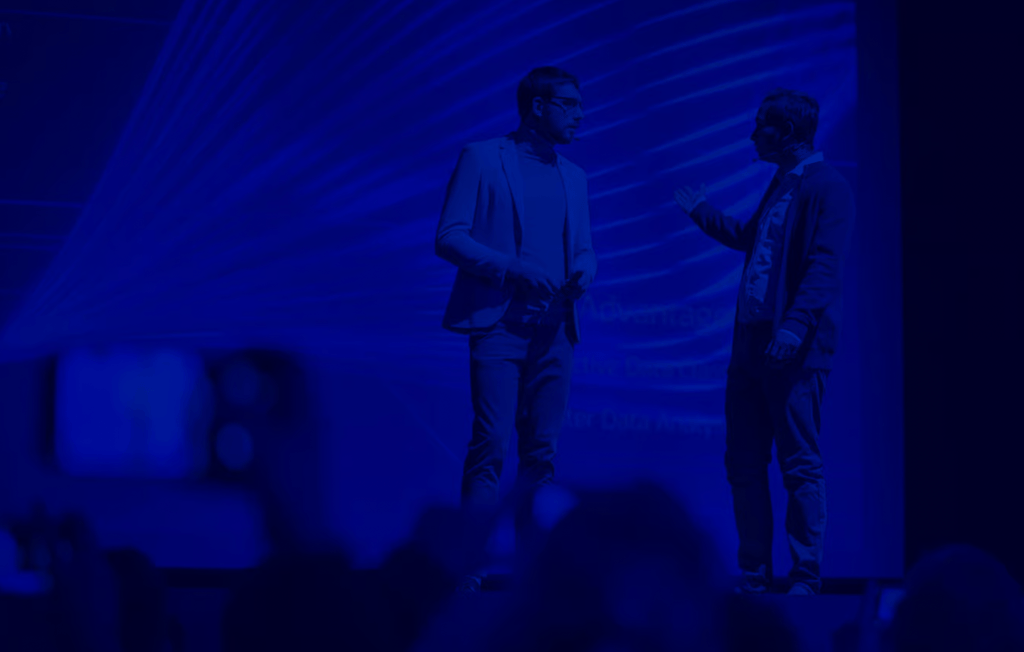 Stage: Startup CEO and Hardware Engineer Present New Product. Speakers Lead Lecture on Business, Science, Technology, Entrepreneurship, Health, Ecology, Development, Leadership and all Things Digital