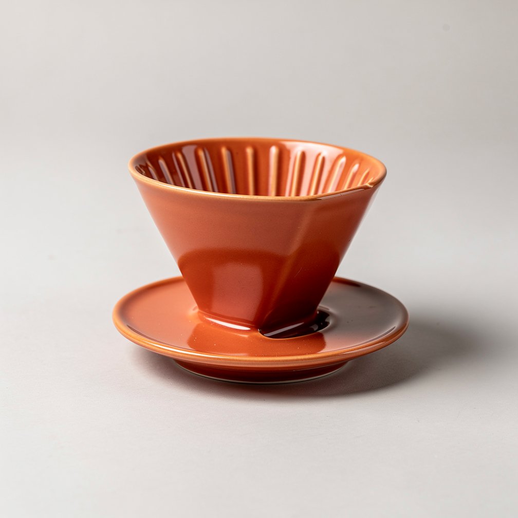 Ceramic pour-over dripper in terracotta