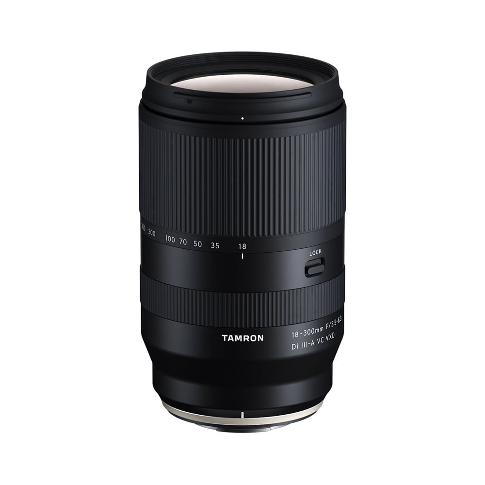 Tamron 18-300mm zoom lens on a white background