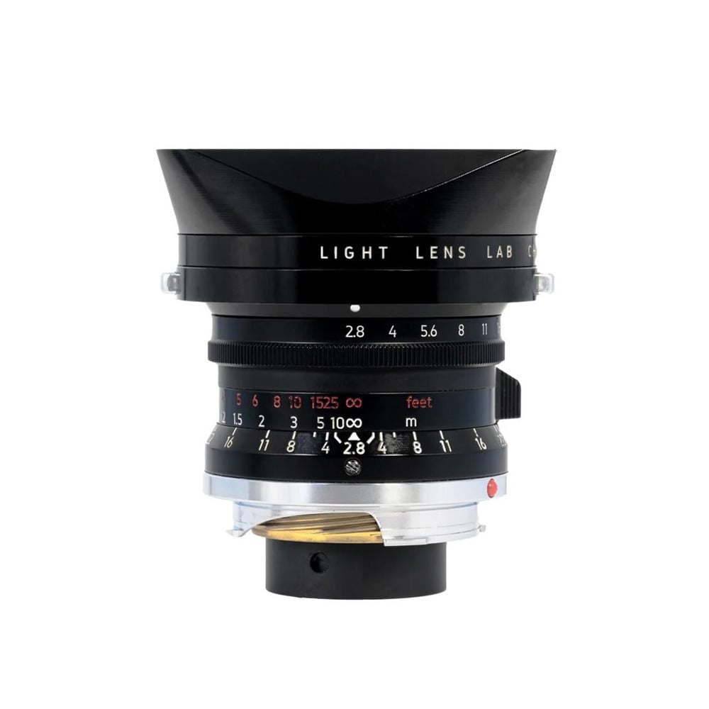 Thypoch Simera 28mm F1.4 silver lens with knurled focus and aperture rings