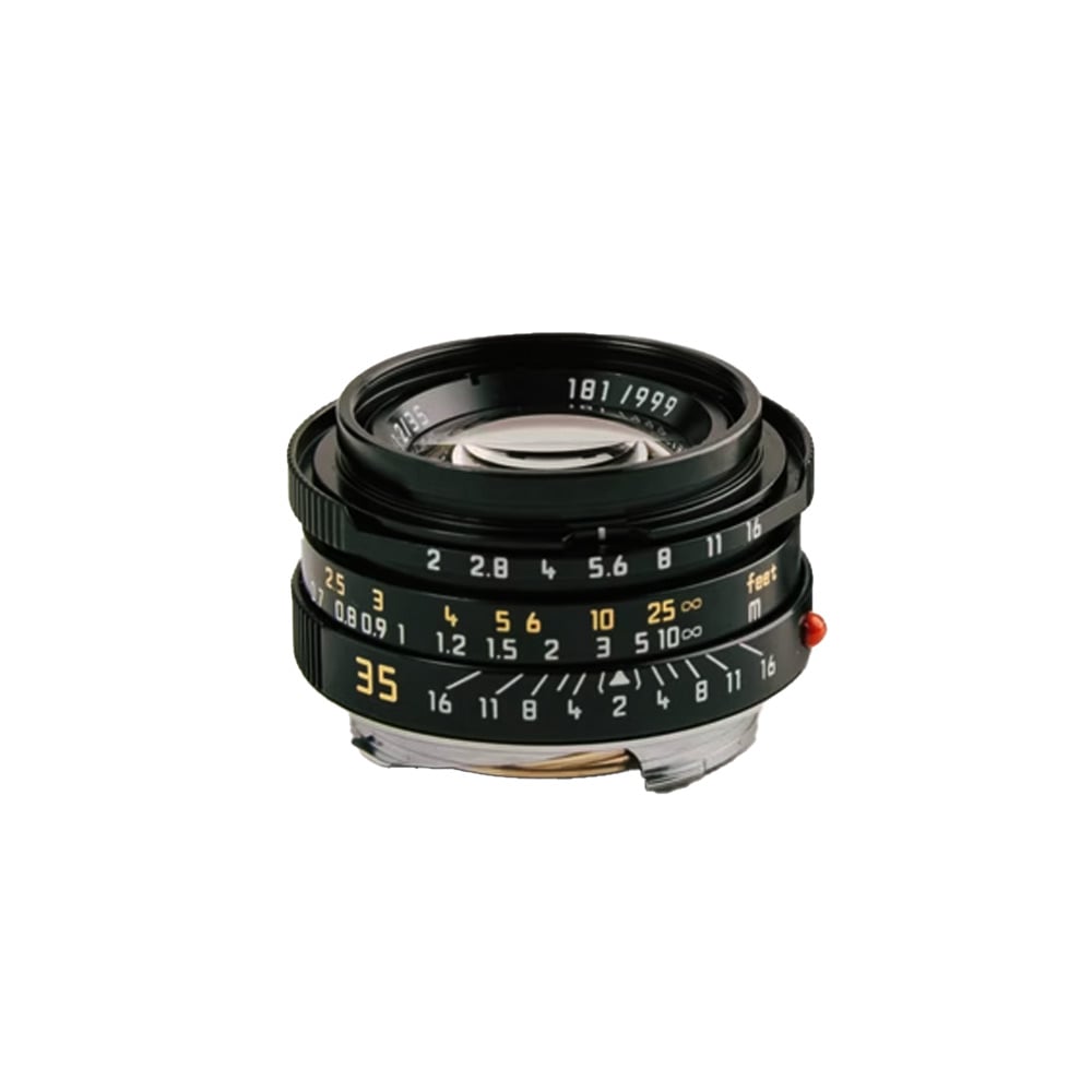 Mandler 35mm f/2 lens photographed on a white background showing focus and aperture rings