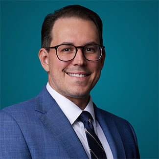 Headshot of Adam Marks