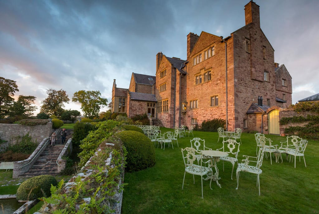 Table and chairs in the garden at Bodysgallen Hall.