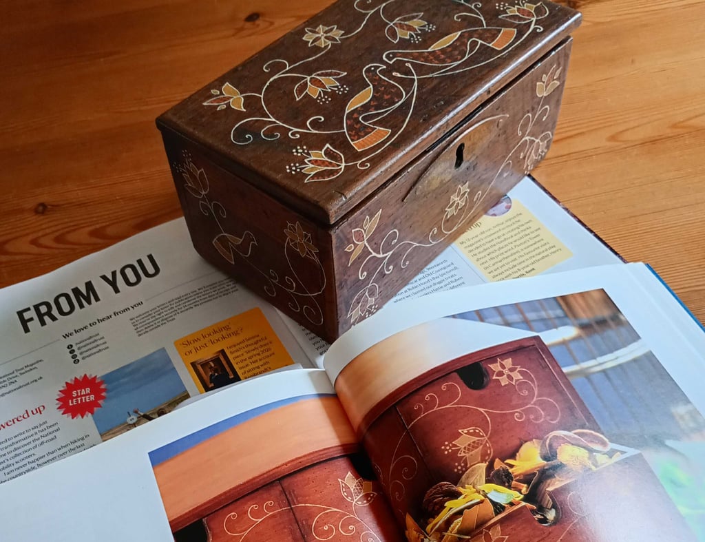 National Trust Magazine, a craft book and a finished painted box displayed together.