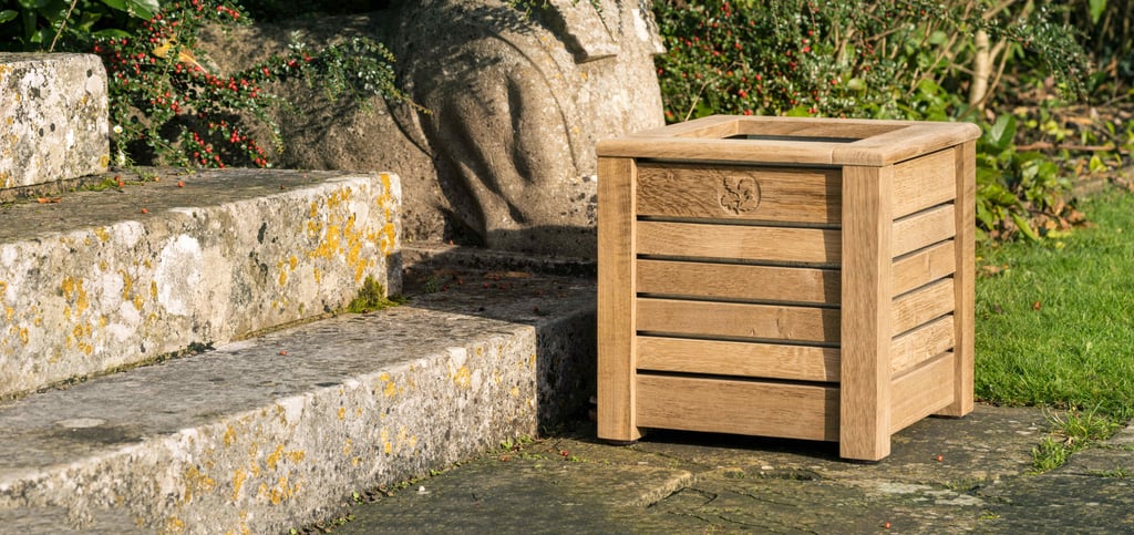 Wooden oak planter in garden