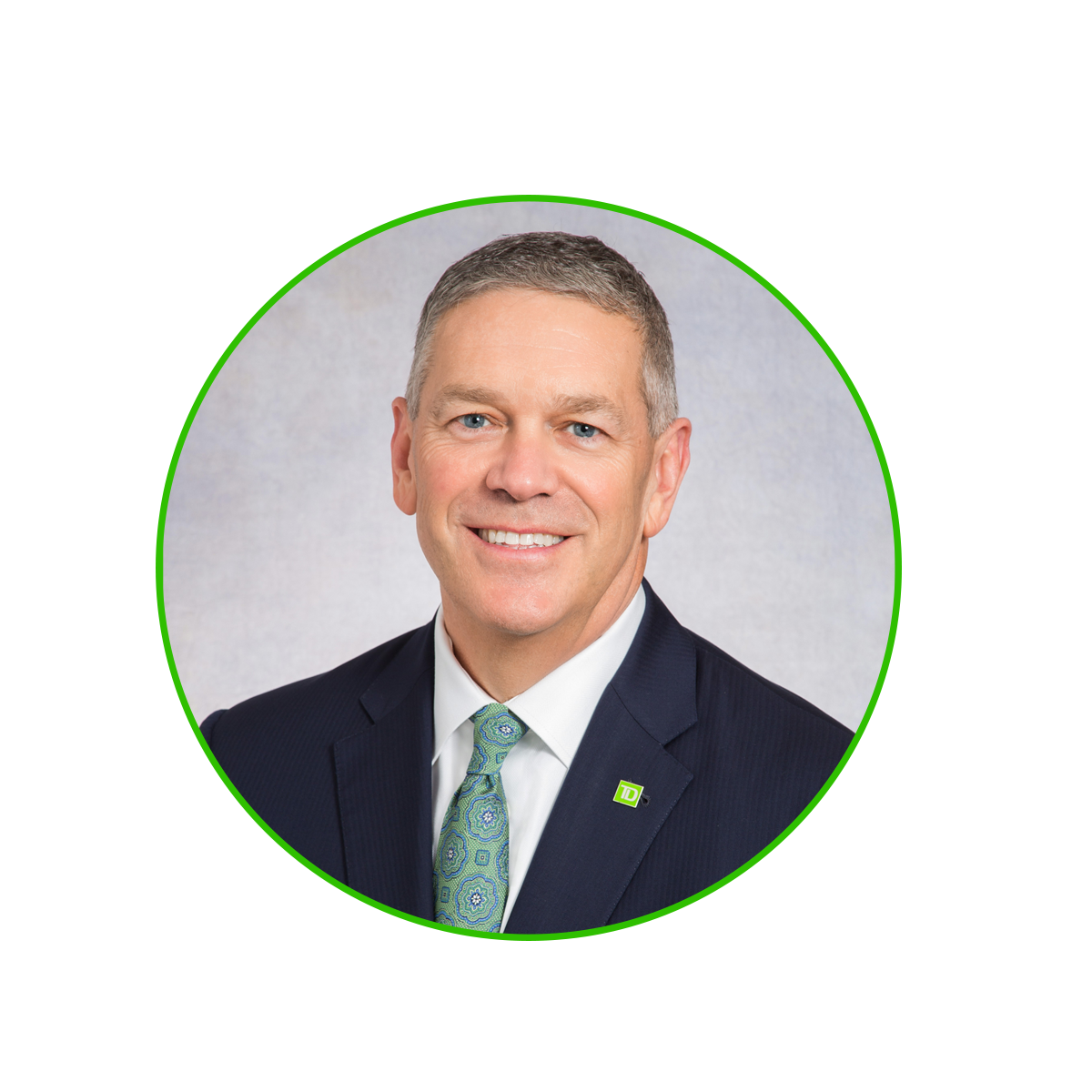 Photo of Chris Ward (Man with short hair and suit with green tie)